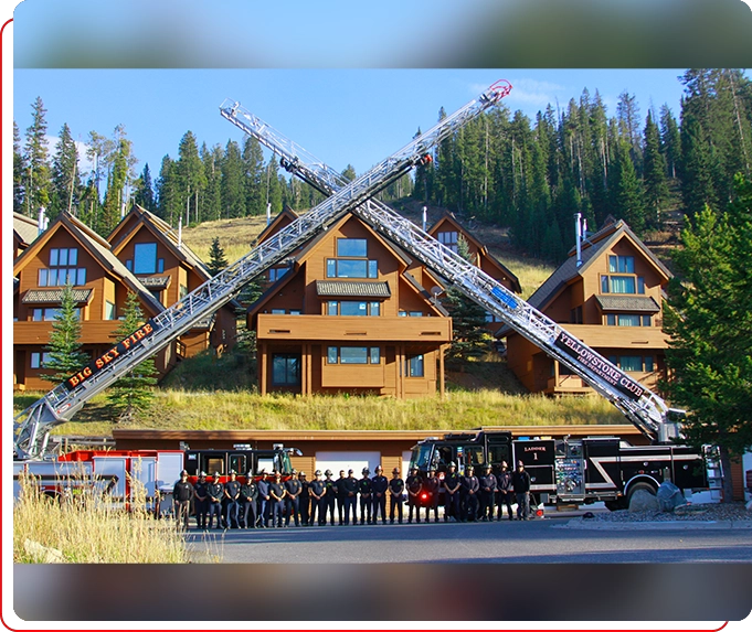 A group of people standing around in front of houses.