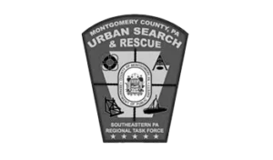 A black and white patch of the montgomery county urban search & rescue.
